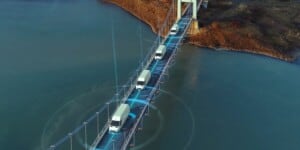 Self driving trucks crossing a bridge